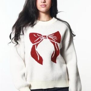Elegant White Sweater with Red Bow Accent